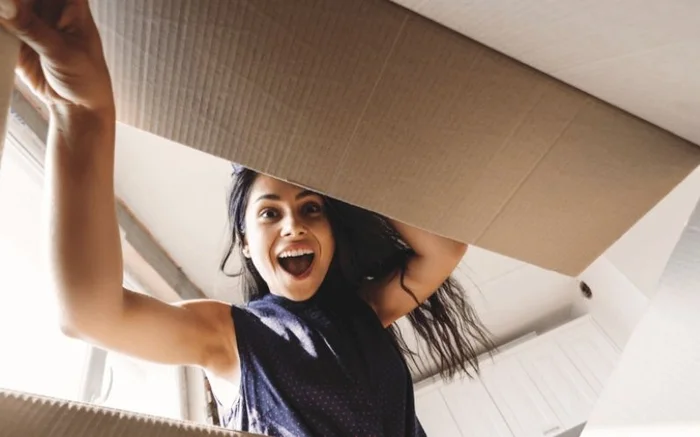 Lady opening a box