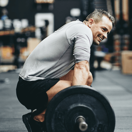 Man lifting heavy weight in the gym